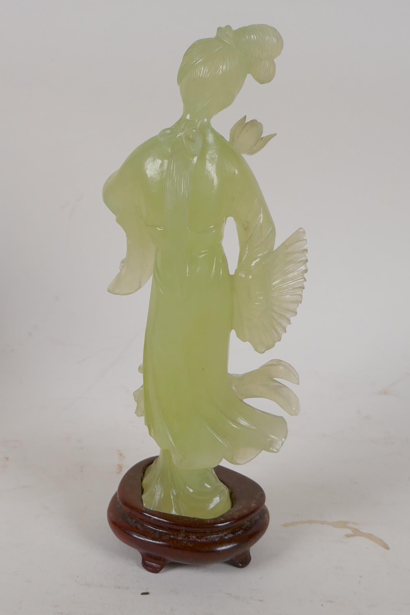 A carved greenstone figure of a Chinese lady, on a hardwood base, 8" high - Image 3 of 3