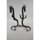 A pair of Chinese bronze dragons, 16½" high