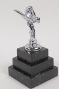 A small silver plated figure, 'The Spirit of Ecstacy', on a stepped marble base, 5" high