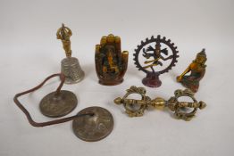 A Tibetan ceremonial bell, a pair of cymbals and a vajra, together with two bronze figures of Buddha