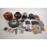 A quantity of cigarette lighters, ash trays, table cigarette boxes and hip flasks