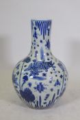 A Chinese blue and white porcelain bottle vase with carp and lotus flower decoration, 23½" high