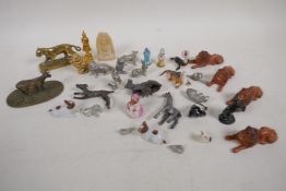 A quantity of small metal and ceramic animal and other figurines