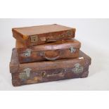 A vintage leather suitcase by R.W. Forsyth, a smaller leather case and an attache case, 26" x 16"