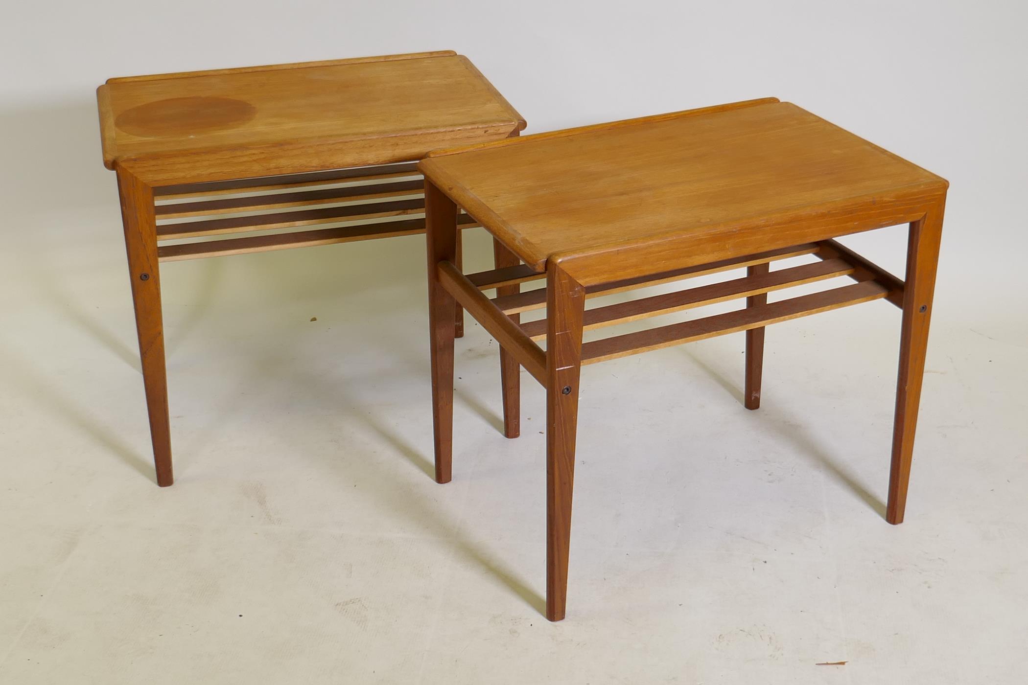 A pair of mid century teak side tables with slatted undertiers, 23" x 15" x 20"