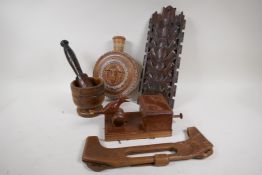 A collection of carved wood items to include a Black Forest letter rack, cigarette box, mortar and