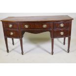 A C19th mahogany bowfront sideboard with five drawers, crossbanded top and drawers, and original