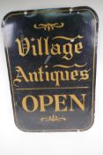 A painted double sided metal sign, Village Antiques, 20" x 28"