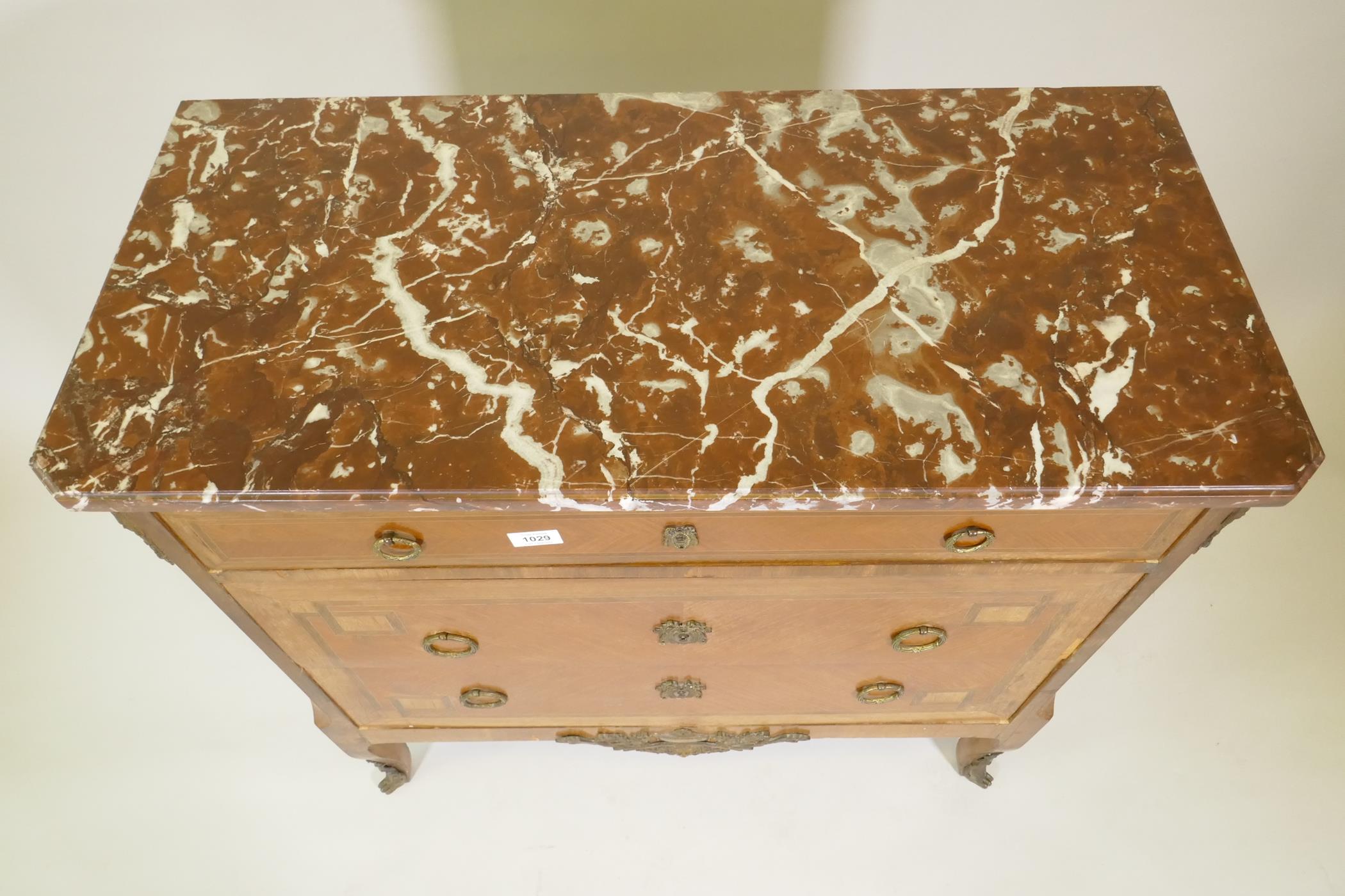 A French late C19th Louis XV style inlaid kingwood three drawer commode, with rouge marble top and - Image 4 of 4