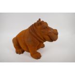 A cast iron garden figure of a hippopotamus, 11" high