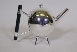 A Christopher Dresser style silver plated tea pot with ebonised wood handle, 6" high