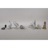 Three Lladro porcelain duck ornaments, two Nao porcelain ducks and two other, largest 4½" high