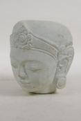 An Indian reconstituted stone head bust of a goddess, 3"