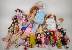 A quantity of small dolls