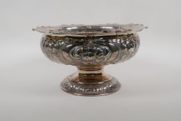 A Victorian hallmarked silver bowl with embossed floral decoration, by Henry Atkin, Sheffield, 1900,