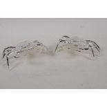 A pair of table salts cast as crabs, 5" wide
