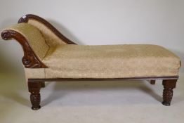 A Victorian style chaise longue with scroll end and carved show wood, 68" long