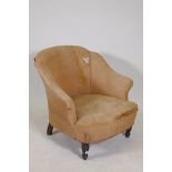 Victorian fan back nursing chair, raised on turned rosewood supports, lacks castors