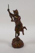 A Japanese gilt bronze figure of an Oni, 7½" high