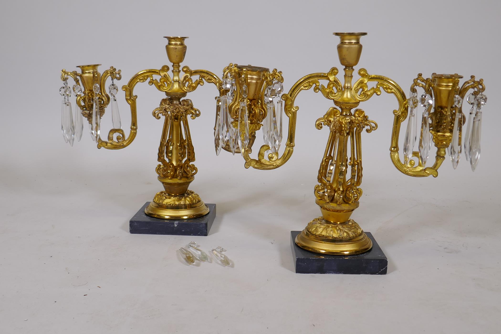 A pair of C19th two branch candelabra with pierced columns and lustre drops, lacking three, 13" high - Image 3 of 3