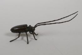 A Japanese jizai style articulated bronze okimono beetle, 5" long