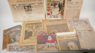 A collection of Royal Commemorative memorabilia including a Coronation flag and editions of Surrey