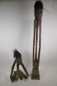 An African carved hardwood and hair tribal fertility figure, and another carving of a slender