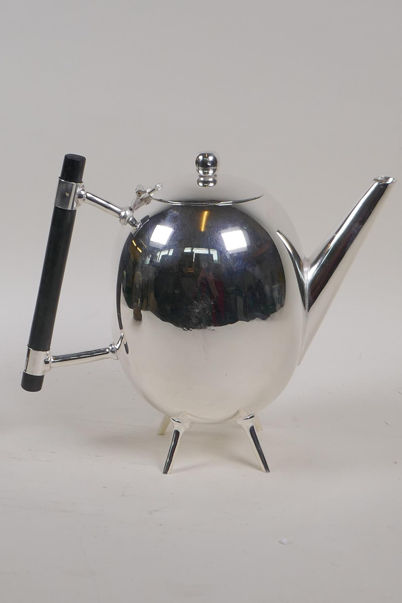A Christopher Dresser design silver plated teapot, 7½" high