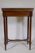 A C19th French mahogany card table triple fold out top, raised on fluted supports, 22" x 14" x 31"