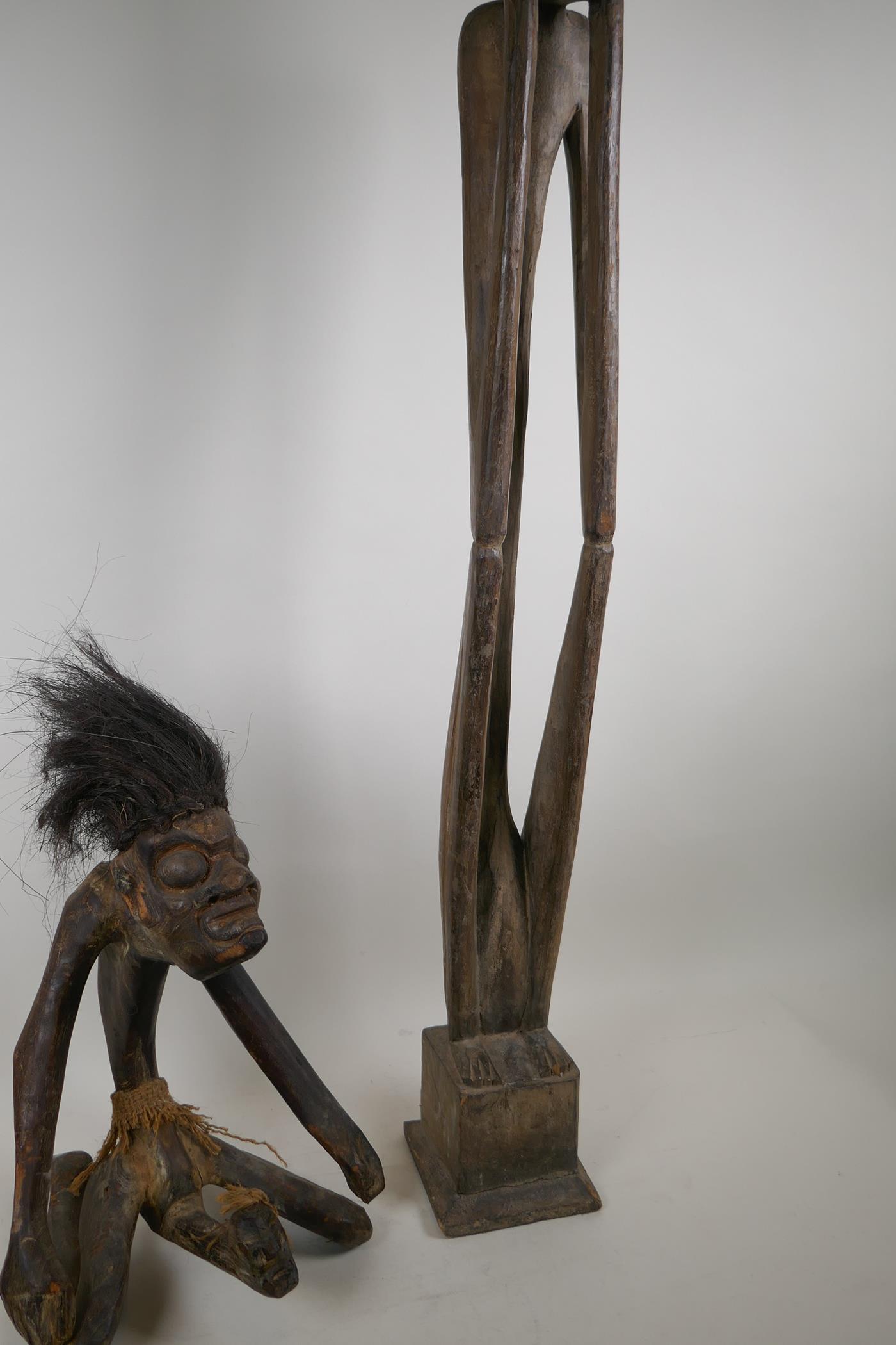 An African carved hardwood and hair tribal fertility figure, and another carving of a slender - Image 4 of 5