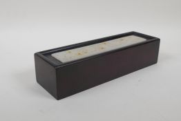 A Chinese hardwood scribe's box with an inset jade style panel, 10" x 3"