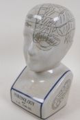 A porcelain phrenology head, 11" high