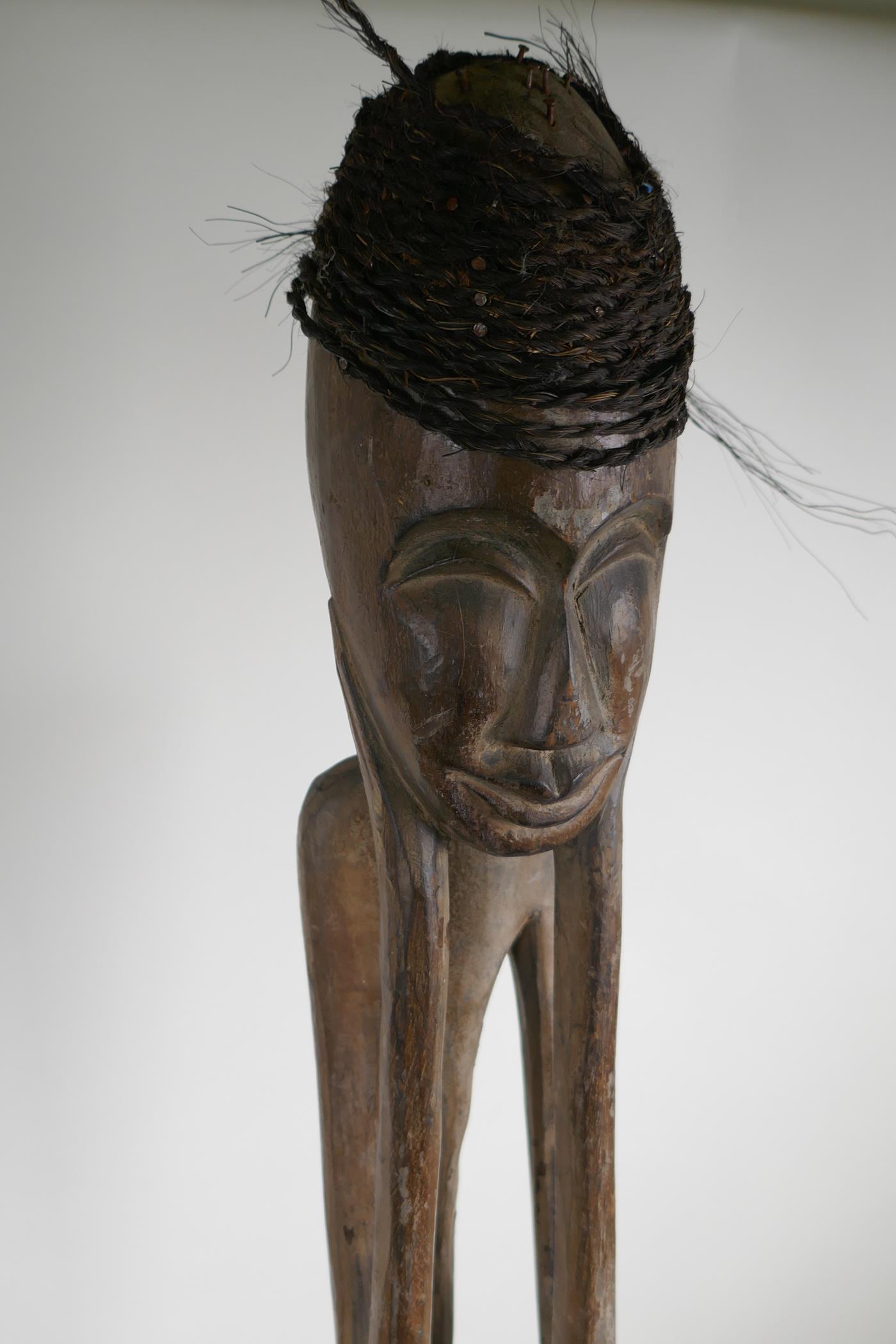 An African carved hardwood and hair tribal fertility figure, and another carving of a slender - Image 3 of 5