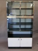 A 1970s/80s Fertleman 'Starlight' display cabinet, 36" x 15½", 71" high