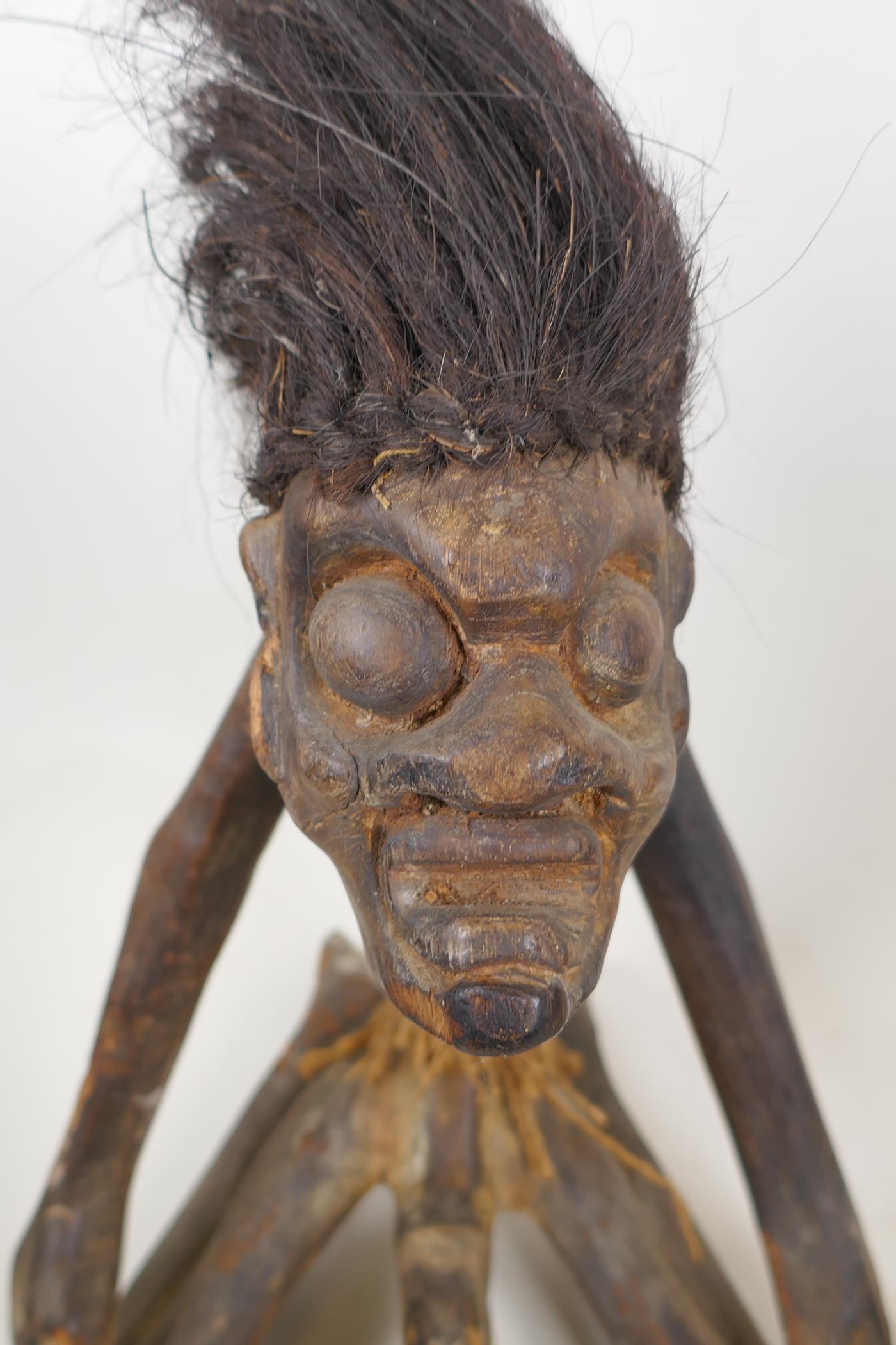 An African carved hardwood and hair tribal fertility figure, and another carving of a slender - Image 5 of 5