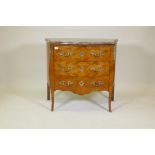 A C19th French serpentine front tulipwood commode, with rouge marble top, ormolu mounts and