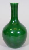A Chinese ceramic vase with emerald green crackle glaze and seal mark to base, 7" high