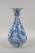 A Chinese blue and white porcelain pear shaped vase decorated with asiatic flora, 12" high