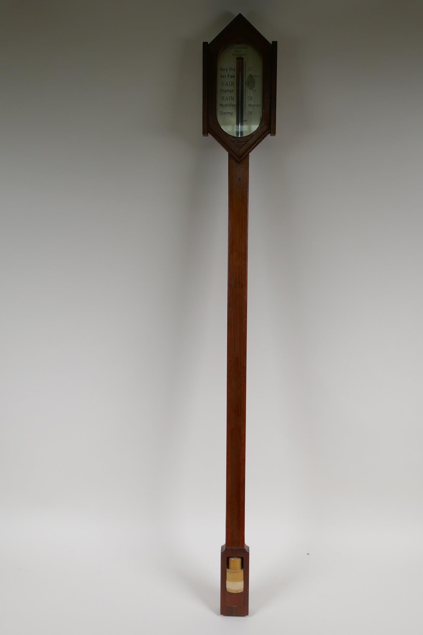 A mercury stick barometer by J.F. Lowndes of Blackpool, 37" long