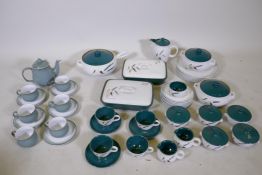 A quantity of Denby Greenwheat dinnerware and a Denby celadon glaze part tea set