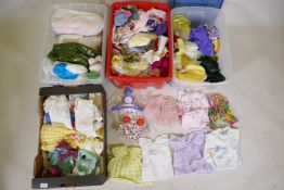 A large quantity of dolls' clothes