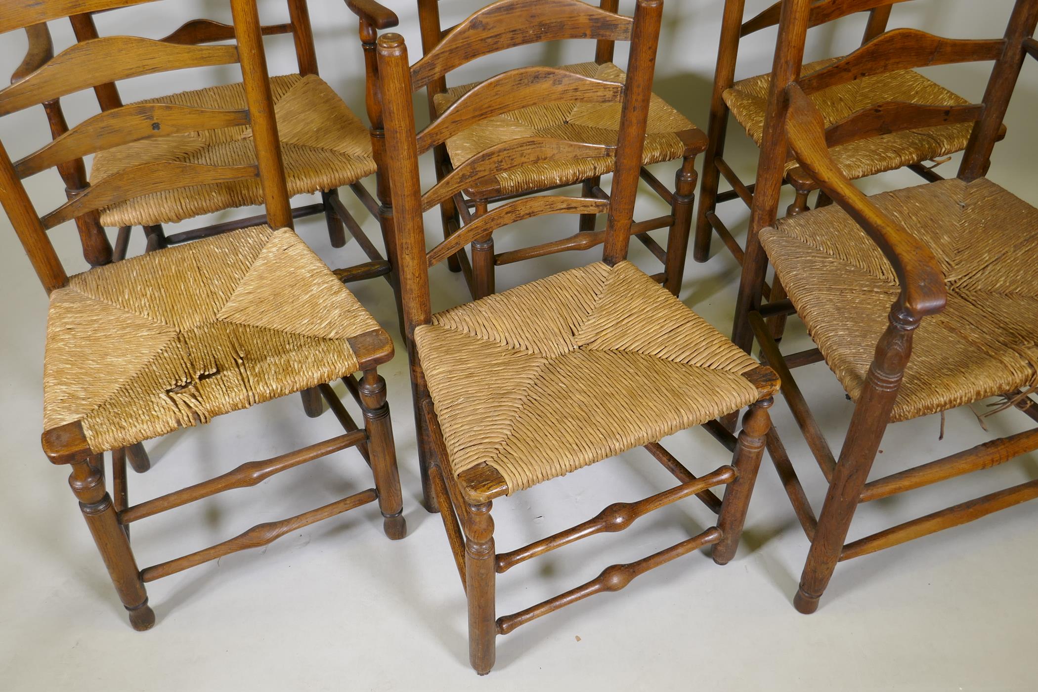 A set of six (4+2) ash ladderback chairs with rush seats, late C18th/early C19th - Image 2 of 4