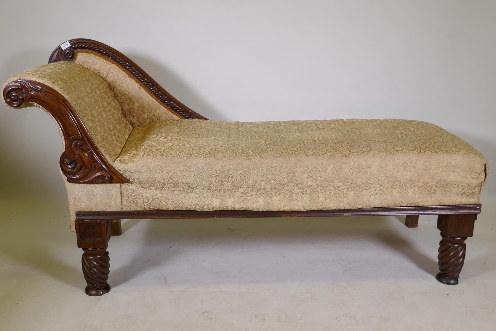 A Victorian chaise longue with scroll end and carved show wood, Adapted, 68" long