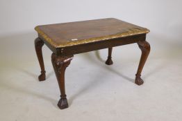A Georgian style walnut footstool, raised on carved cabriole supports, adapted with later rosewood