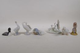 Three Lladro porcelain duck ornaments, two Nao porcelain ducks and two other, largest 4½" high