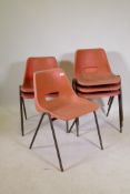 Seventy late C20th plastic stacking chairs with steel frames