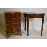 A yew wood serpentine front chest of four drawers, 20" x 15" x 32", and a mahogany demi-lune console