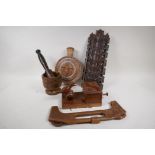 A collection of carved wood items to include a Black Forest letter rack, cigarette box, mortar and