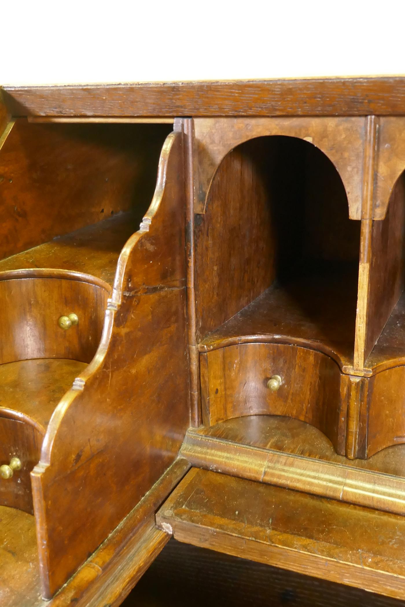 An C18th feather banded and figured walnut fall front bureau, the stepped interior with concave - Image 5 of 10