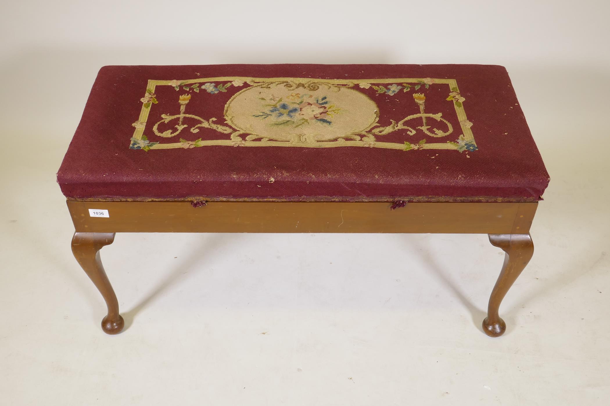 An Essenby mahogany duet stool with woolwork upholstered lift up seat, raised on cabriole - Image 2 of 3